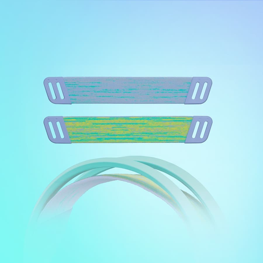 Logitech G335 wired gaming headset in Mint with over-ear cups and boom microphone