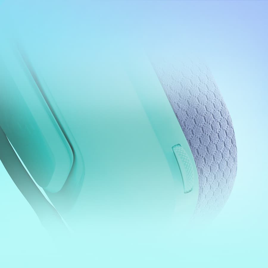 Logitech G335 wired gaming headset in Mint with over-ear cups and boom microphone