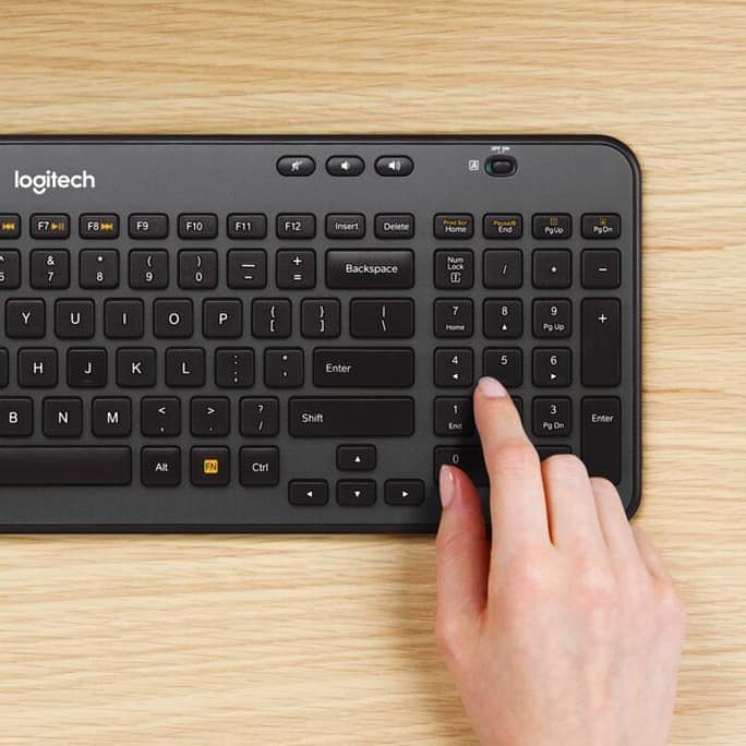 Logitech MK360 wireless keyboard and mouse set in black and beige with USB receiver