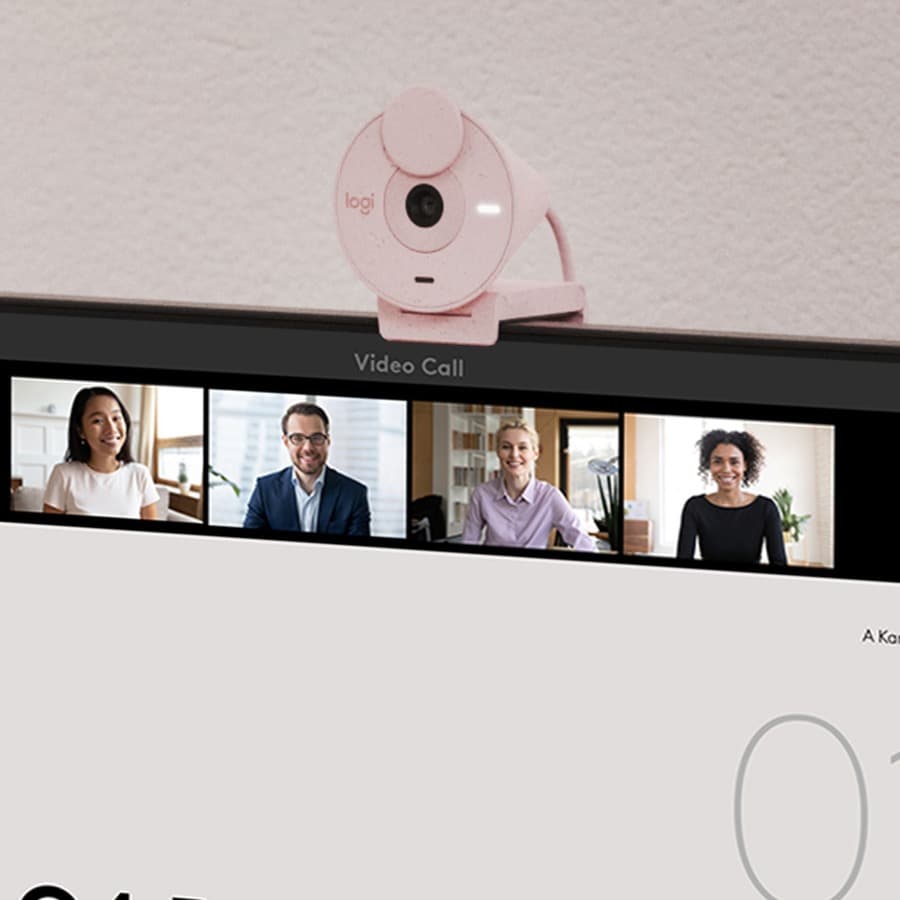 Logitech Brio 300 webcam in rose finish with privacy shutter and clip-on mount