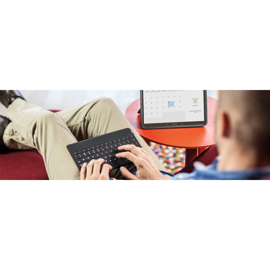 Logitech Keys‑To‑Go slim red Bluetooth keyboard for iPad with compact layout