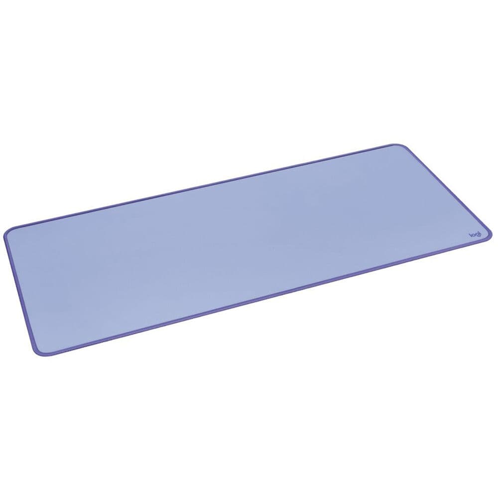 Logitech Studio Series desk mat in lilac on a modern office desk