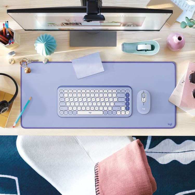 Logitech Studio Series desk mat in lilac on a modern office desk