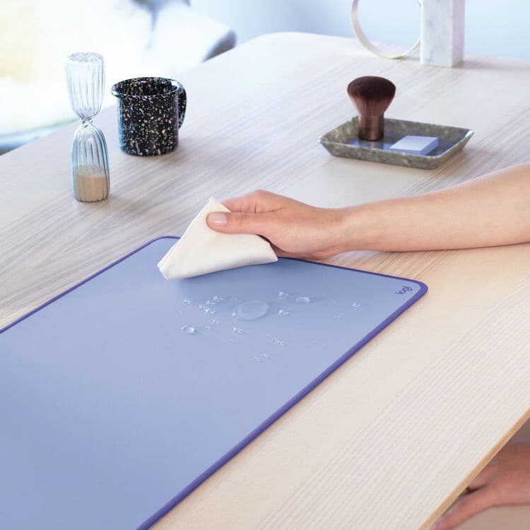 Logitech Studio Series desk mat in lilac on a modern office desk