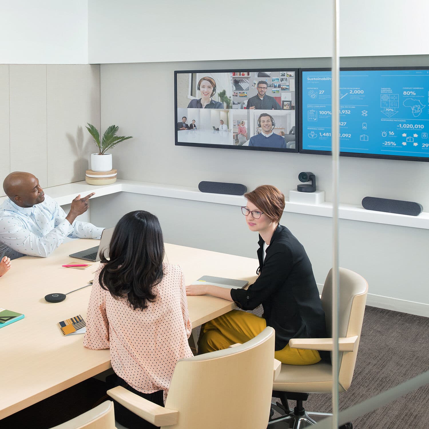 Logitech Rally Plus conference system with white mic pods for large meeting rooms