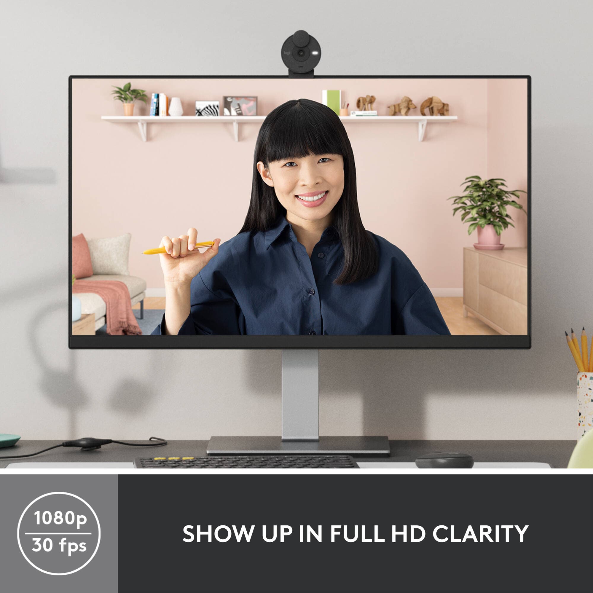 Logitech Brio 300 webcam in graphite with compact clip mount and privacy shutter